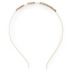 Cerchietto elegante in metallo lucido versatile.