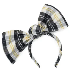 Cerchietto per capelli sui toni dei bianco panna, nero e giallo con grande fiocco decorativo.