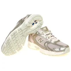 Ginnica New Balance 530 in ecopelle laminata e tessuto