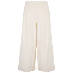 Pantaloni ampi color bianco panna dal design versatile e minimalita.