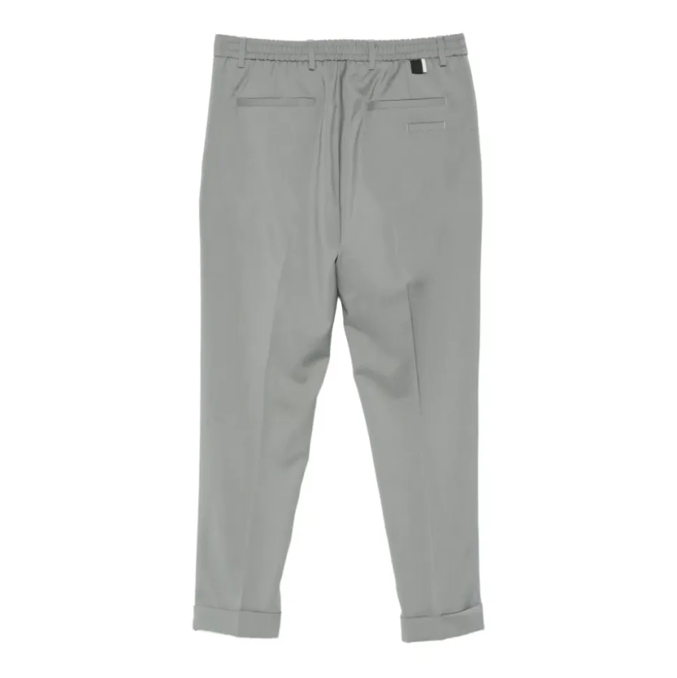 Pantaloni cropped in lana a pieghe